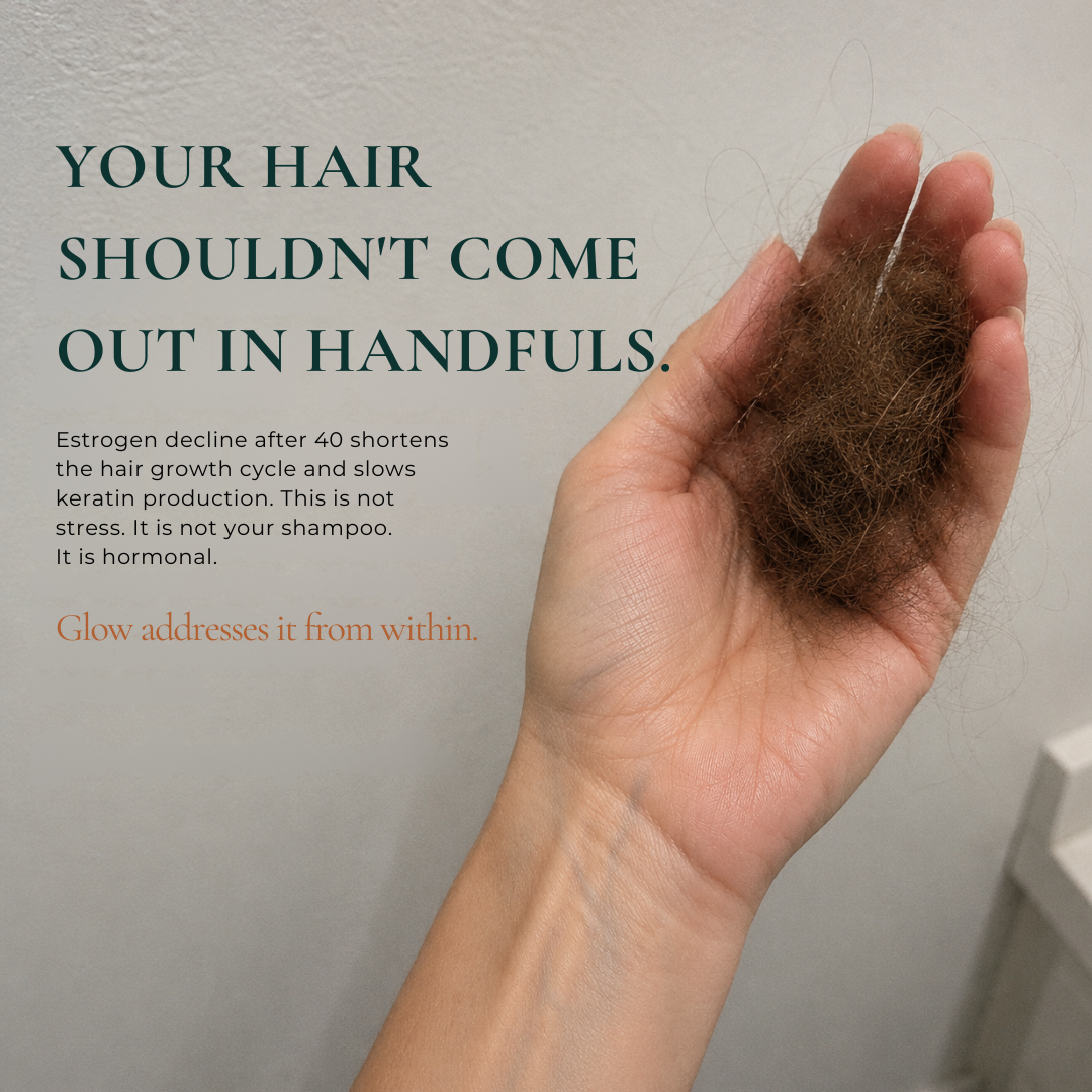 Hand holding a clump of hair with text about hair health on a neutral background
