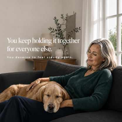 Woman sitting on a couch with a dog, surrounded by home decor elements.